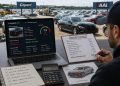 Predictive salvage vehicle valuation: evaluating auction feasibility